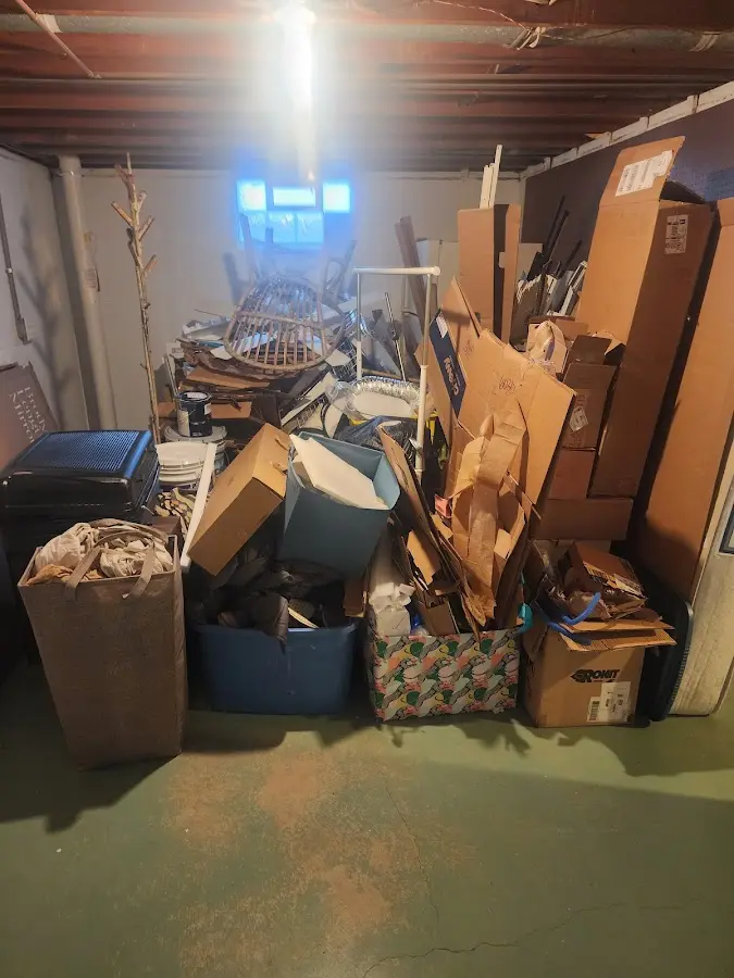 Roll-off dumpster container at job site for 8 Yard Dumpster Rental in Weaverville